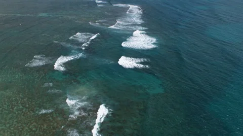 Aerial look down through clear turquoise surf Stock Footage 59357922