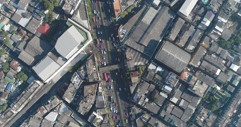 Aerial look down view city block building transport road day time with vehicle Stock Footage 128490249