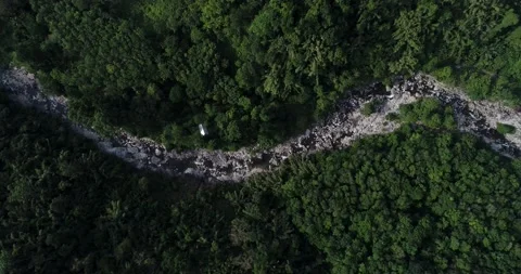 Aerial look down view waterfall in tropical deep forest rocky with river Stock Footage 134450373