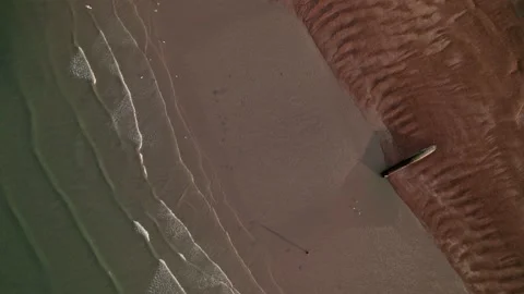 Aerial looking down on Brighton Beach Stock Footage 194494301