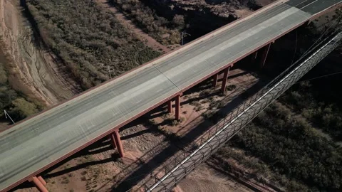 Aerial looking down at Highway 89 at Cameron Old Bridge in Arizona Stock Footage 295467132