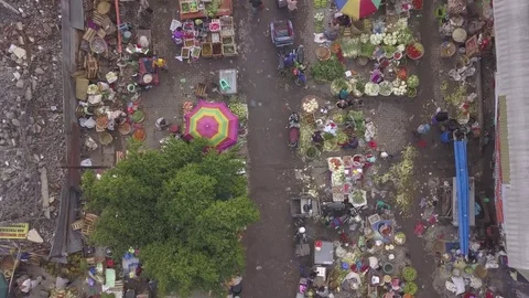 Aerial Looking down on vegatable and fruit street market in Semarang Indonesia Stock Footage 82180001