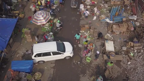 Aerial Looking down on vegatable and fruit street market in Semarang Indonesia Stock Footage 82180237