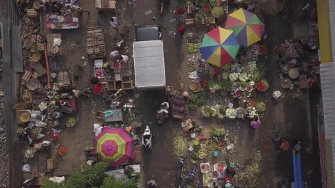 Aerial Looking down on vegatable and fruit street market in Semarang Indonesia Stock Footage