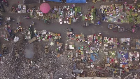 Aerial Looking down on vegatable and fruit street market in Semarang Indonesia Stock Footage 84313268