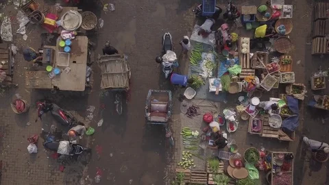 Aerial Looking down on vegatable and fruit street market in Semarang Indonesia Stock Footage 84314799