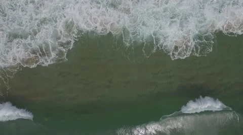 Aerial Looking down on waves breaking Video stock 69029407