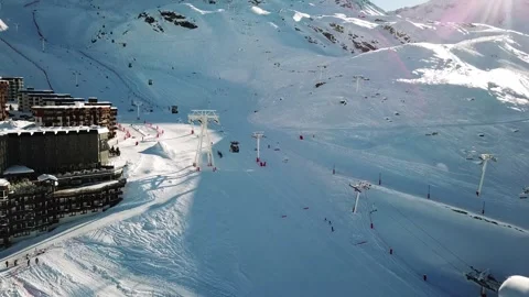 Aerial looking up the ski slopes in Val Thorens, Farance Video stock 328531719