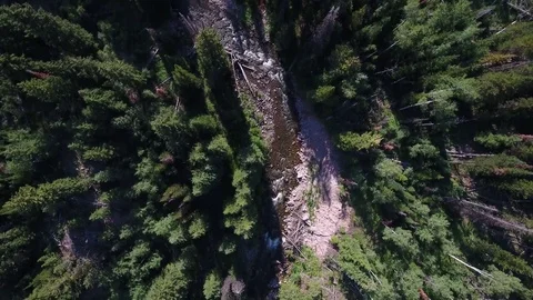 Aerial looking straight down mountain stream Stock Footage 78432238