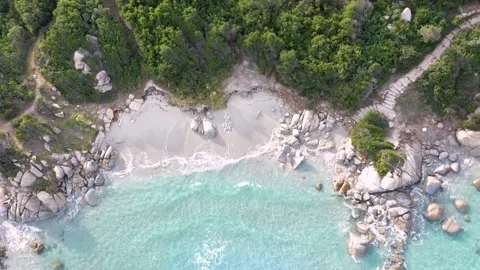 Aerial loop of the secluded Spiaggia il Golfetto Beach, Sardinia, Italy Stock Footage 144835487