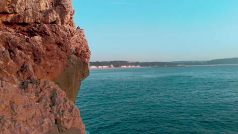 Aerial low angle panning view beautiful rocky coastline Stock Footage 222622493