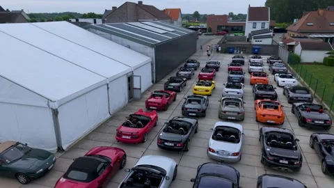 Aerial Low Glide Over Convertible Cars at Dealership Lot. Stock Footage 340535851