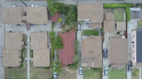 Aerial: Low income neighborhood flyover in south central Los Angeles Stock Footage