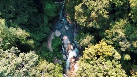 Aerial Mae Sae Waterfall cascading through jungle Chiang Mai Thailand Stock-Footage 331476444
