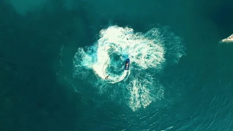 Aerial: Man on flyboard making flip. Stock Footage 70449899