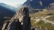 Aerial Of Man Walking On Slackline Stock Footage