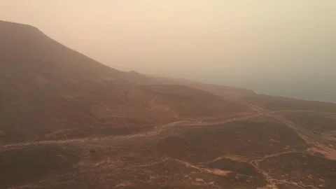 Aerial Mars Volcano view landscape Fuerteventura Island during Calima Weathe Stock Footage 170204925