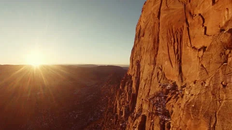 Aerial of Massive Red Cliffs at Sunset, Pull Away Video stock 25269946