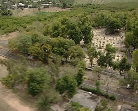 Aerial of Mauritius over cemetry and fields. Stock Footage 11309662