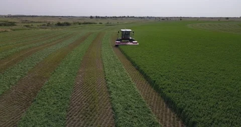 Aerial Medium of a Swather - Slide Back Stock Footage 221862132
