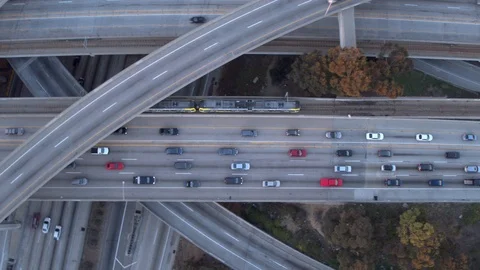 Aerial Metro rail going through traffic in los angeles Stock Footage 85651018