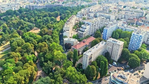 Aerial mid angle panning drone shot over the Parc des buttes chaumont in Paris Stock-Footage 341075066