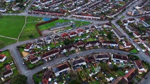 Aerial mid angle quick panning drone shot over English Southampton Suburb Stock Footage 329467160