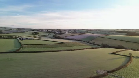 Aerial Mid-Day fly over fields Cornwall England Stock Footage 327624143
