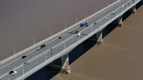 Aerial mid shot - Traffic on the M4 crossing the Charles III bridge Stock Footage 311603083