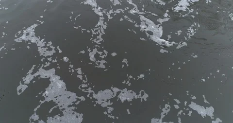 Aerial Midwest over small stream water pooloing and swirling slow motion 库存影片 102533360