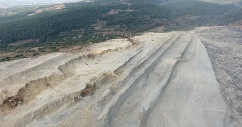 Aerial Mining Pit and Working Machines Stock Footage 115953869