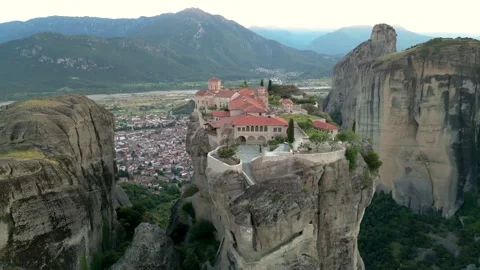 Aerial Monastery of Holy Trinity Sunset Slow Flight Clockwise in Meteora, G.. Stock Footage 334893554