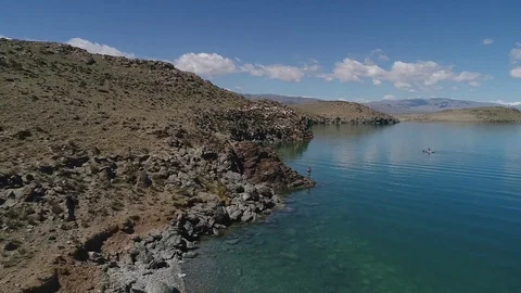 Aerial. Mongolia from above. Flock of Sheep and Goat. Uureg Nuur Lake Stock Footage 95378853