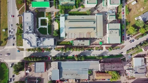 Aerial motion above workshop roofs of production complex Stock Footage 122360261