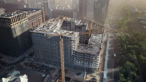 Aerial motion timelapse of the construction site of a modern skyscraper. Stock Footage 186788465