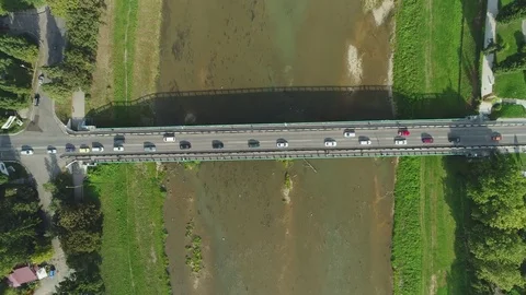 Aerial Motion Timelapse (Time-Lapse) of Bridge and Transport ower the River 스톡 동영상 82966123