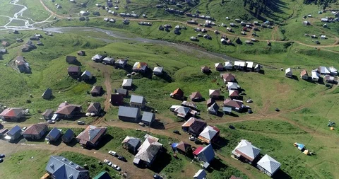 Aerial: motion view over a small village Stock-Footage 114499779