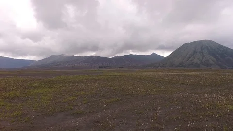 Aerial of Mount Bromo volcano during cloudy 動画素材 129291012