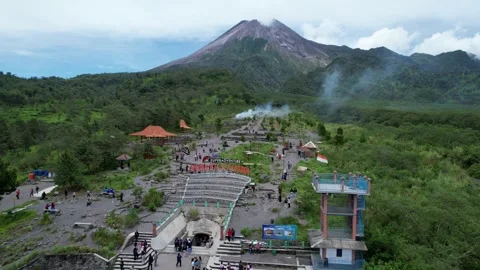 Aerial Mount Merapi Volcano Surrounded by Misty Forest Stock Footage 321649001