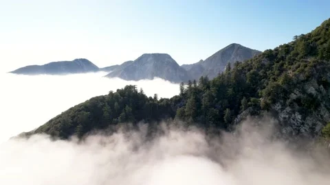 Aerial of Mount Wilson over the clouds 스톡 동영상 153052197