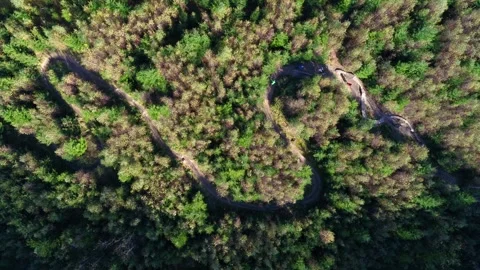 Aerial of mountain driving down a forest track 2 Stock Footage 283071912