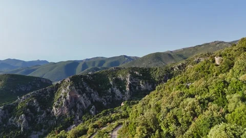 Aerial mountain landscape with cliffs and winding road Greece Stock-Footage 332822539