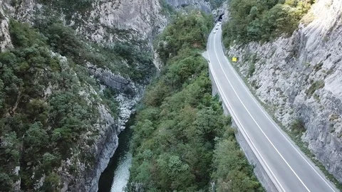 Aerial, Mountain river in canyon, аuto in the mountains goes on the road, aerial Stock Footage 80706162
