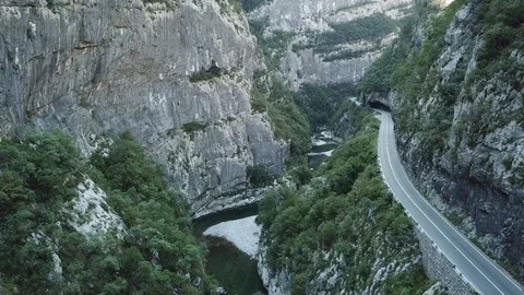 Aerial, Mountain river in canyon, аuto in the mountains goes on the road, aerial Stock Footage 80706264
