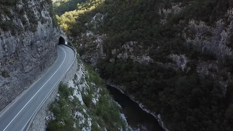Aerial, Mountain river in canyon, аuto in the mountains goes on the road, aerial Stock Footage 80708546