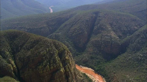 Aerial of mountain river flowing through lush mountain valley, Fast Flight Down Stock Footage 109443183