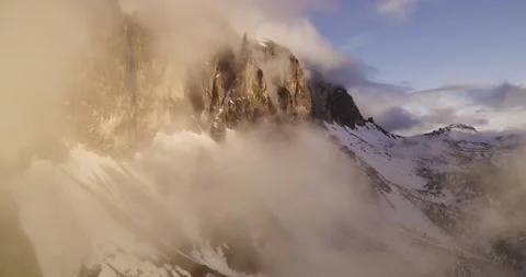 Aerial Mountain view during sunset in the Dolomites above Val Gardena. Clouds Stock Footage 132109102