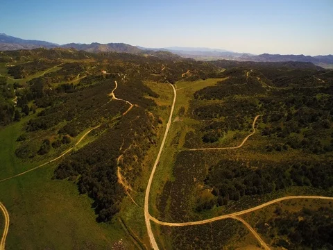 Aerial of mountains and empty roads over San Jacinto California 動画素材 80254811