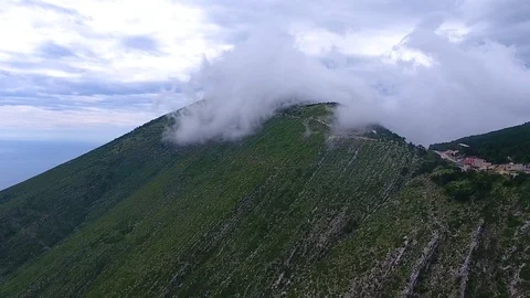 Aerial. Mountains in clouds at Llogara Pass, Llogara National Park, Albania Stock Footage 91820448