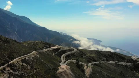 Aerial. Mountains in clouds at Llogara Pass, Llogara National Park, Albania Stock Footage 157008178